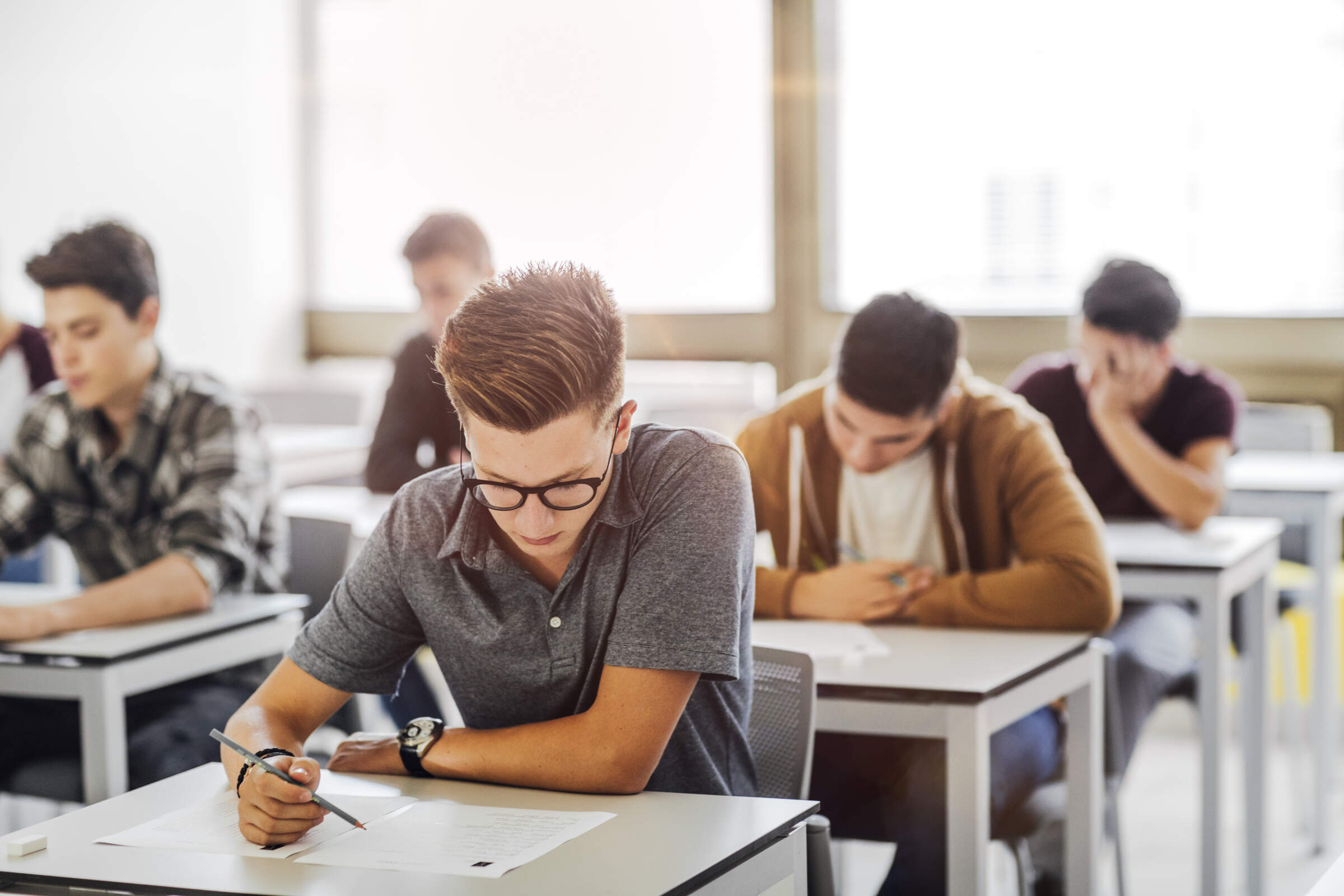 Group,Of,High,School,Students,Doing,Exam,At,Classroom.